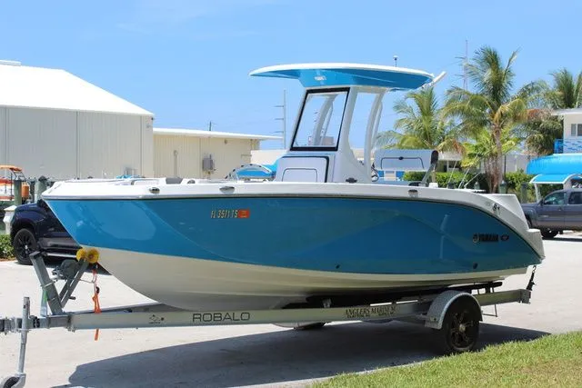 Slide: The Image of 2023 Yamaha Boats 222 FSH Sport E on a trailer. - 3