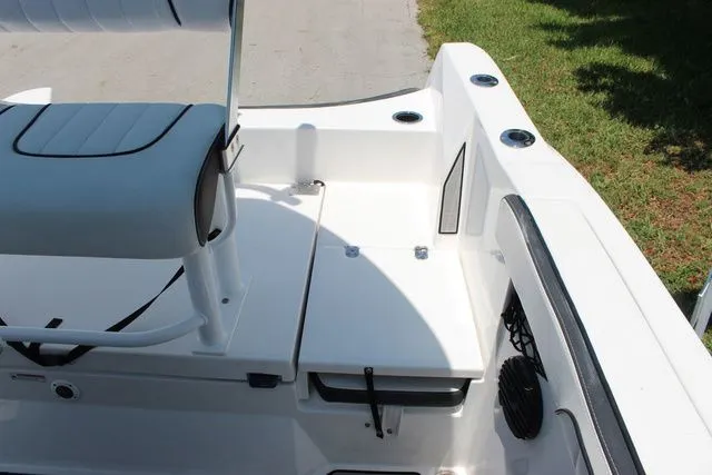 Slide: The Image of Yamaha Boats 2023 222 FSH Sport E interior view, white seating and deck design. - 33