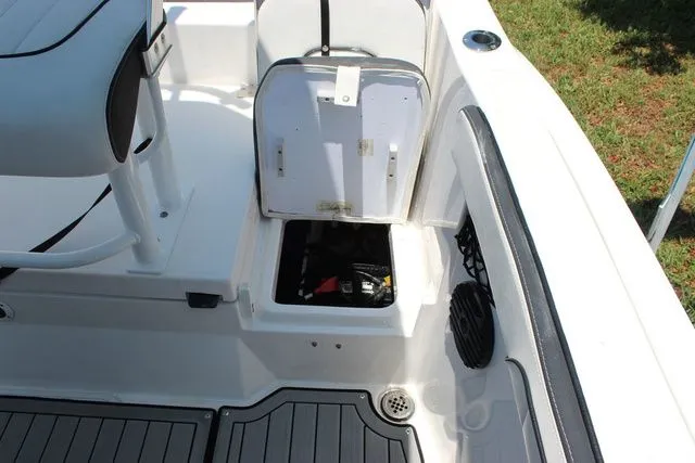 Slide: The Image of Yamaha 222 FSH Sport E 2023, open storage compartment on boat. - 35