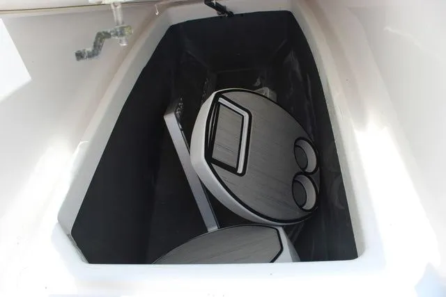Slide: The Image of Storage compartment in Yamaha 222 FSH Sport E boat, 2023 model. - 37