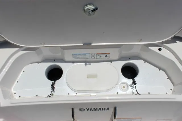 Slide: The Image of Yamaha 222 FSH Sport E 2023 boat storage compartment open. - 41