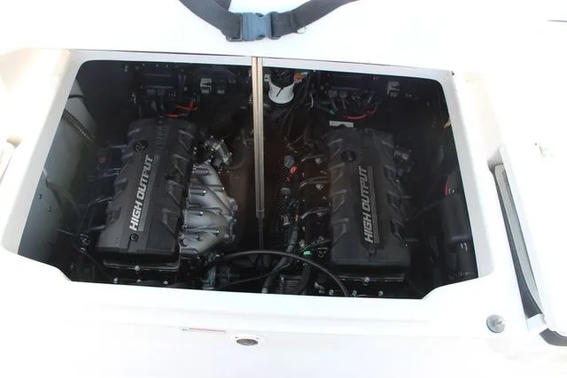 Slide: The Image of Engine compartment of 2023 Yamaha Boats 222 FSH Sport E with high output engines. - 42