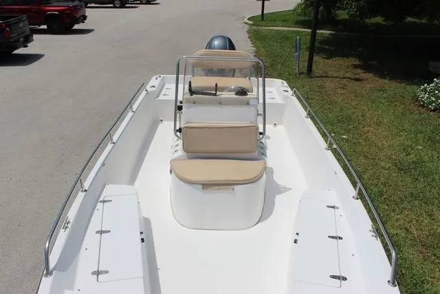 Slide: The Image of 2001 Sea Pro 2100 SV boat with seating and helm console. - 14