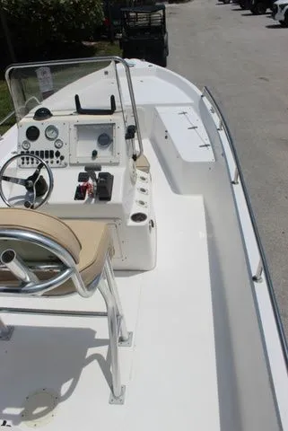 Slide: The Image of Interior view of a 2001 Sea Pro 2100 SV boat with helm console. - 15