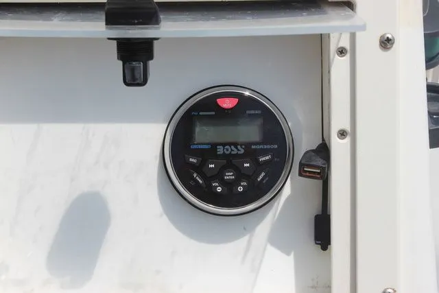 Slide: The Image of Boss audio system in a 2001 Sea Pro 2100 SV boat. - 18