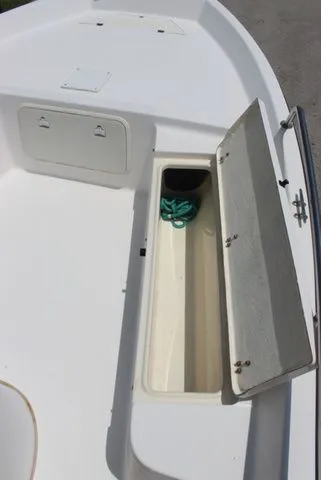 Slide: The Image of Storage compartment on a 2001 Sea Pro 2100 SV boat. - 23