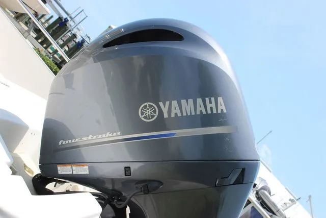 Slide: The Image of Yamaha outboard motor on a 2001 Sea Pro 2100 SV boat. - 27