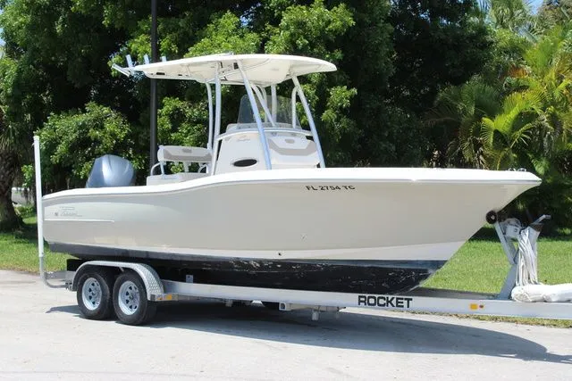 The Image of 2014 Pioneer 222 Sportfish boat on trailer, side view. - 1