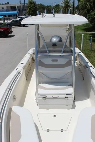 Slide: The Image of 2014 Pioneer 222 Sportfish boat with T-top and seating area. - 10