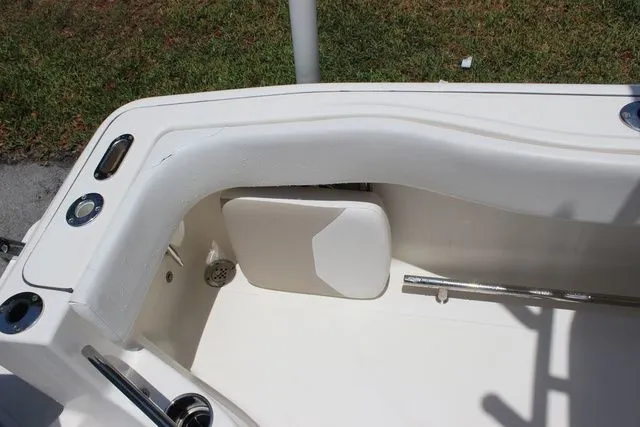 Slide: The Image of Interior view of a 2014 Pioneer 222 Sportfish boat. - 17