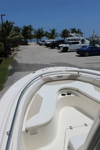 Slide: The Image of Pioneer 222 Sportfish 2014 near beach with palm trees. - 19