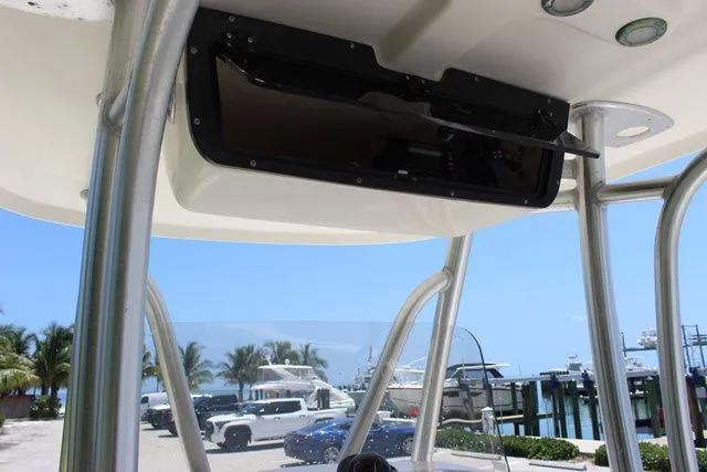 Slide: The Image of Pioneer 222 Sportfish 2014 boat roof with harbor view. - 25