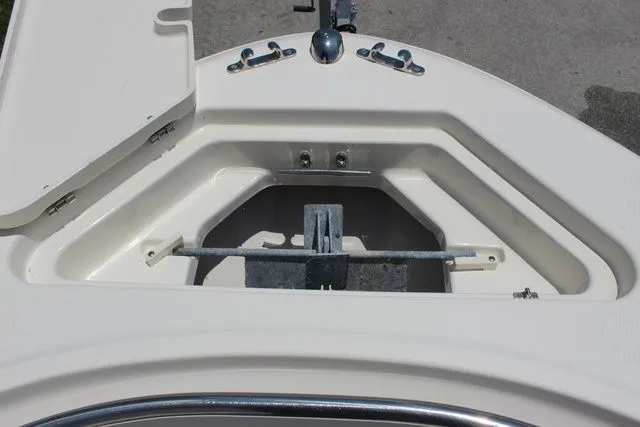 Slide: The Image of Anchor compartment of a 2014 Pioneer 222 Sportfish boat. - 29