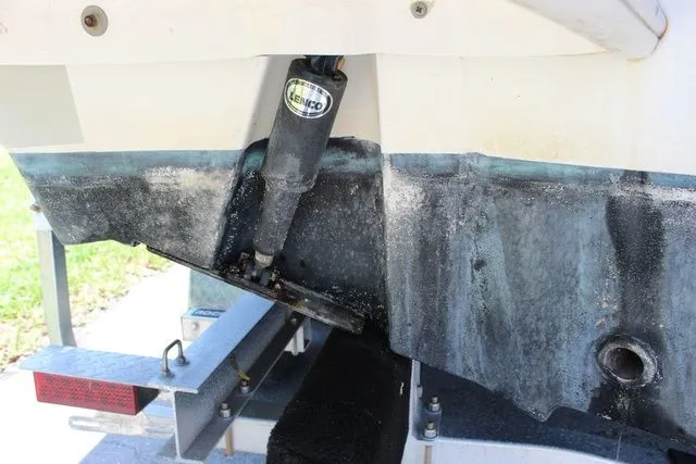 Slide: The Image of Rear view of a 2014 Pioneer 222 Sportfish boat on a trailer. - 31