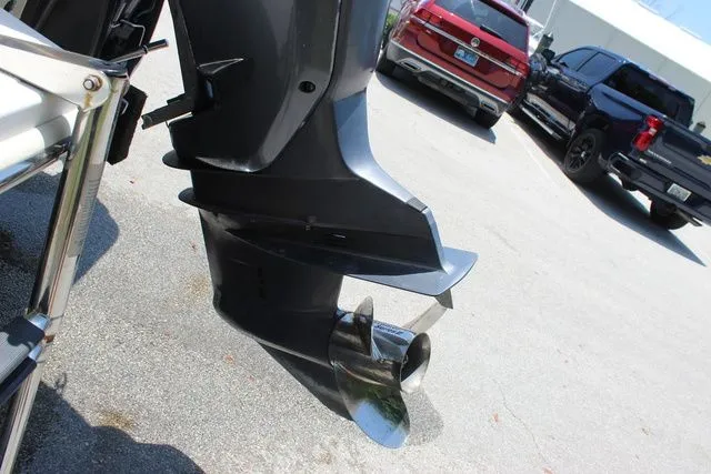 Slide: The Image of Outboard motor of a 2014 Pioneer 222 Sportfish boat. - 32
