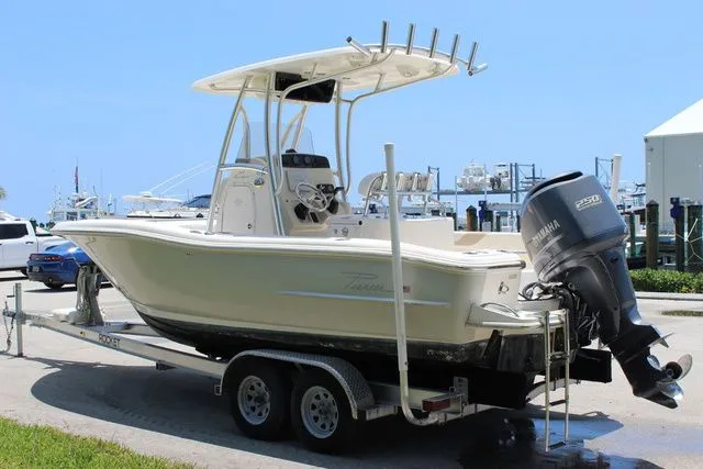 Slide: The Image of 2014 Pioneer 222 Sportfish boat on trailer at marina. - 6
