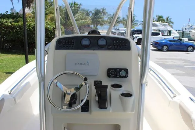 Slide: The Image of Helm console of a 2014 Pioneer 222 Sportfish boat. - 7