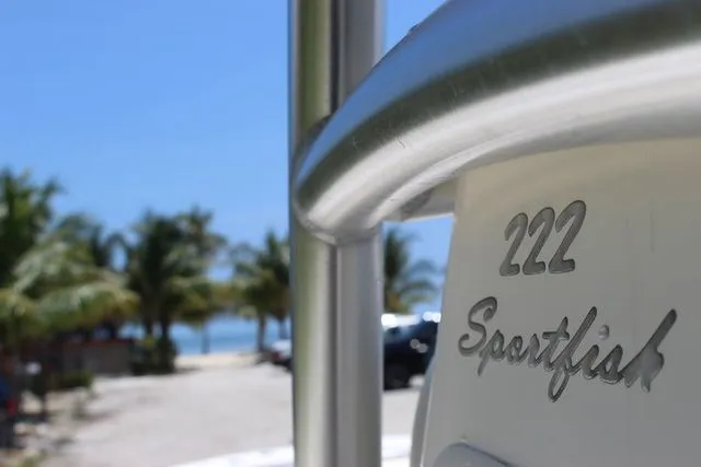 Slide: The Image of Close-up of Pioneer 222 Sportfish boat, 2014 model, by the beach. - 8