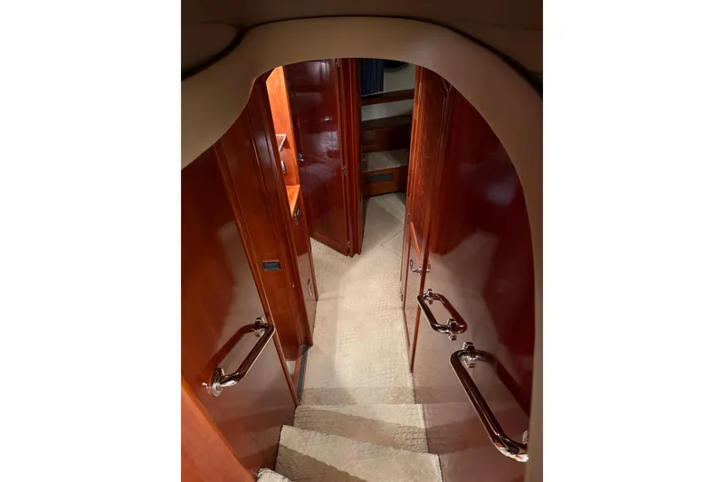 Slide: The Image of Interior view of 2006 Carver 56 Voyager yacht with polished wood finishes. - 22