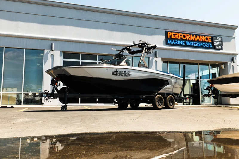 The Image of 2025 Axis A225 boat displayed at Performance Marine Watersports dealership. - 1
