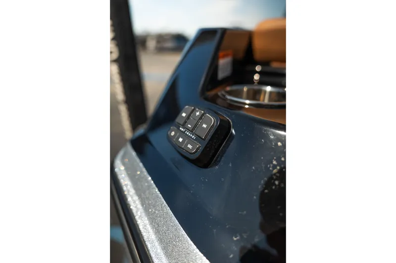 Slide: The Image of Close-up of 2025 Axis A225 boat dashboard with control buttons. - 12