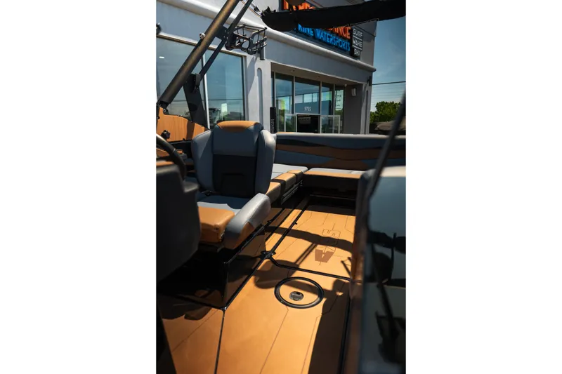 Slide: The Image of Interior of 2025 Axis A225 boat with modern seating and sleek design. - 18