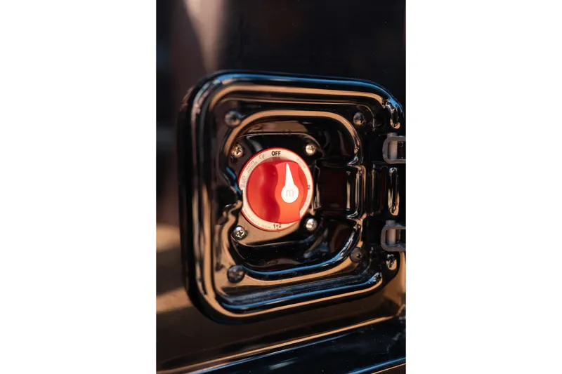 Slide: The Image of Red ignition switch on a 2025 Axis A225 boat dashboard. - 20