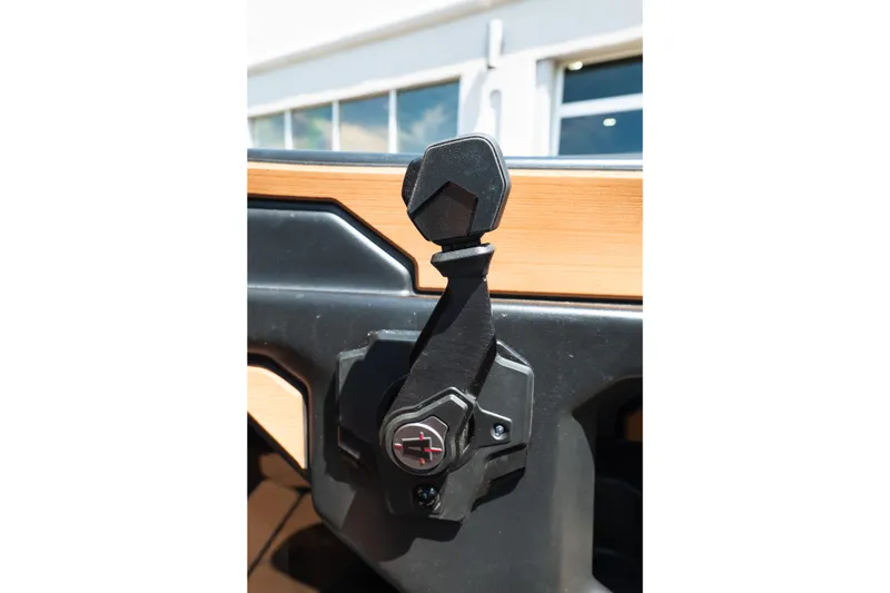 Slide: The Image of Close-up of Axis A225 2025 boat throttle control lever. - 25