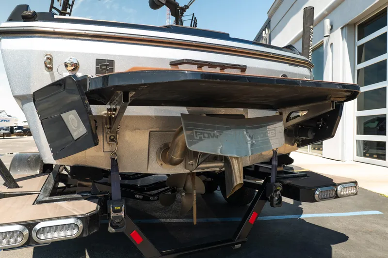 Slide: The Image of Rear view of 2025 Axis A225 boat with propeller and swim platform. - 6