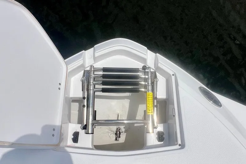 Slide: The Image of 2024 Monterey M-45 boat ladder compartment with stainless steel retractable ladder. - 24
