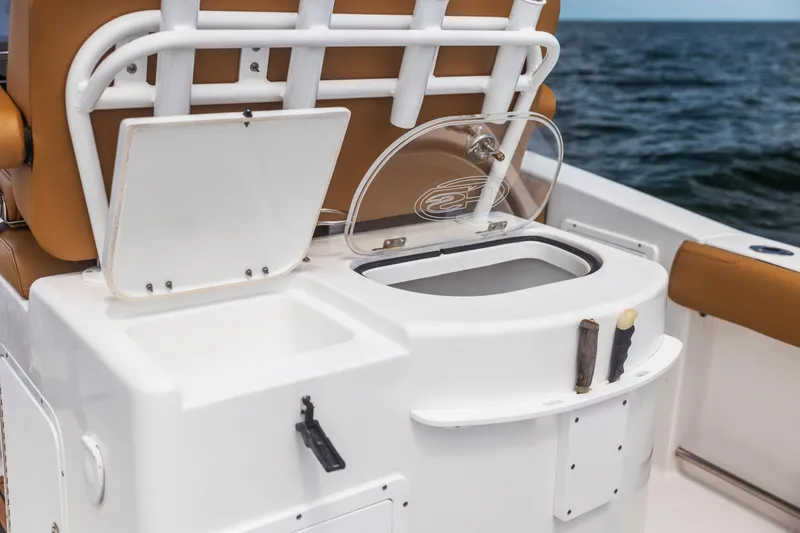 Slide: The Image of 2022 Sea Hunt Gamefish 30 boat interior with seating and storage compartments. - 24