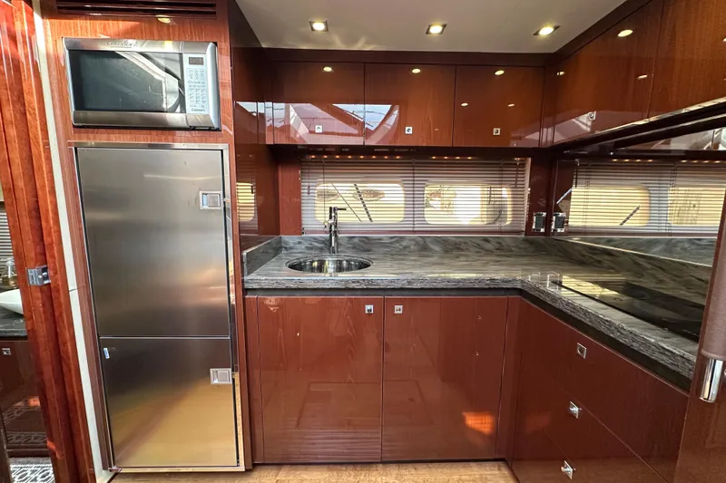 Slide: The Image of Luxurious kitchen interior of 2014 Sea Ray Sundancer 510 yacht with modern appliances. - 18