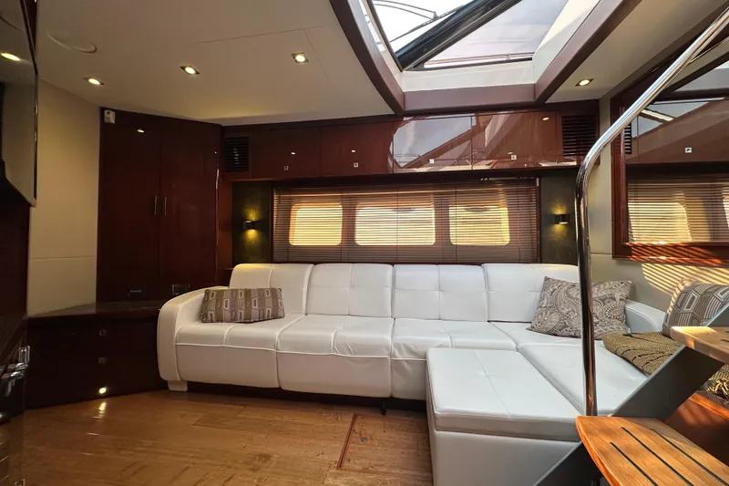 Slide: The Image of Luxurious interior of 2014 Sea Ray Sundancer 510 yacht with white leather seating. - 20