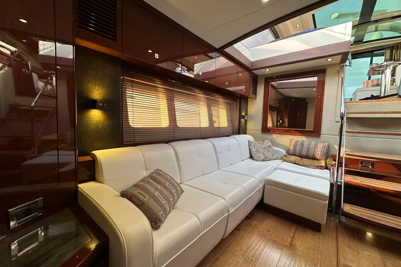 Slide: The Image of Luxurious interior of 2014 Sea Ray Sundancer 510 yacht with white leather seating. - 22