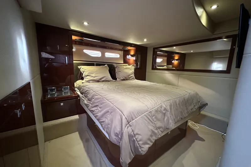 Slide: The Image of Luxurious bedroom interior of 2014 Sea Ray Sundancer 510 yacht with elegant bedding. - 25