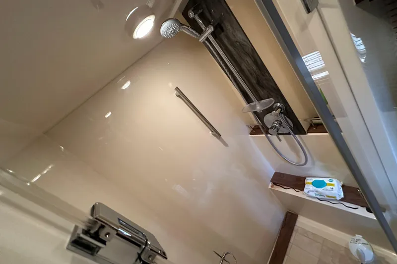 Slide: The Image of Shower area in 2014 Sea Ray Sundancer 510 yacht, featuring modern fixtures. - 29