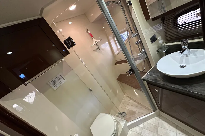 Slide: The Image of Luxurious bathroom in 2014 Sea Ray Sundancer 510 yacht with modern fixtures and shower. - 33