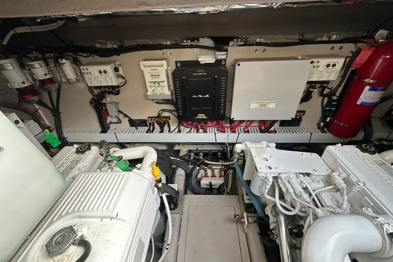 Slide: The Image of Engine room of a 2014 Sea Ray Sundancer 510 yacht, showcasing mechanical components. - 35