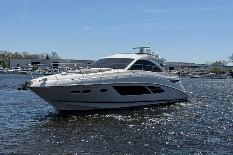 Slide: The Image of 2014 Sea Ray Sundancer 510 yacht cruising on a sunny day. - 39
