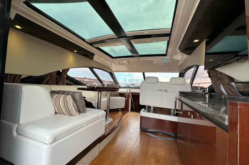 Slide: The Image of Luxurious interior of 2014 Sea Ray Sundancer 510 yacht with modern seating and skylight. - 7