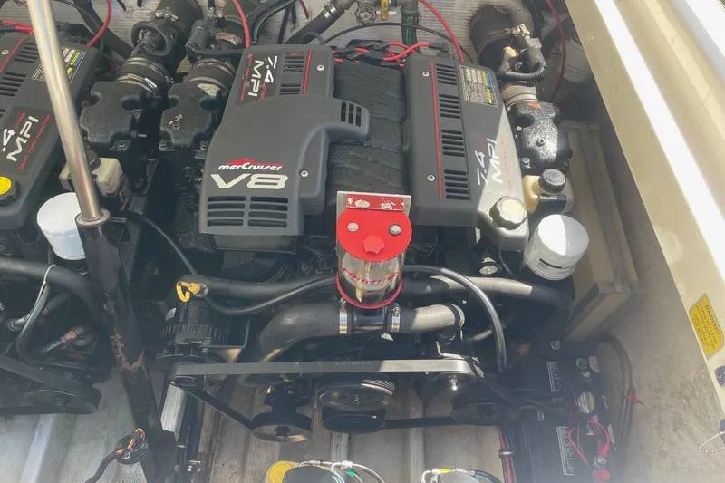 Slide: The Image of Engine compartment of a 1998 Fountain 29 Fever boat with MerCruiser V8 engine. - 10