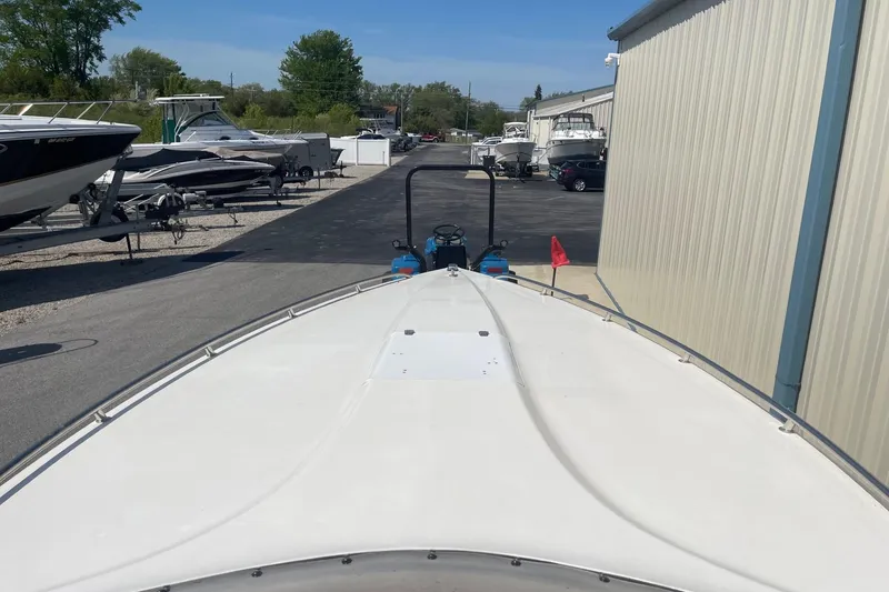 Slide: The Image of 1998 Fountain 29 Fever boat on trailer in marina storage area. - 24