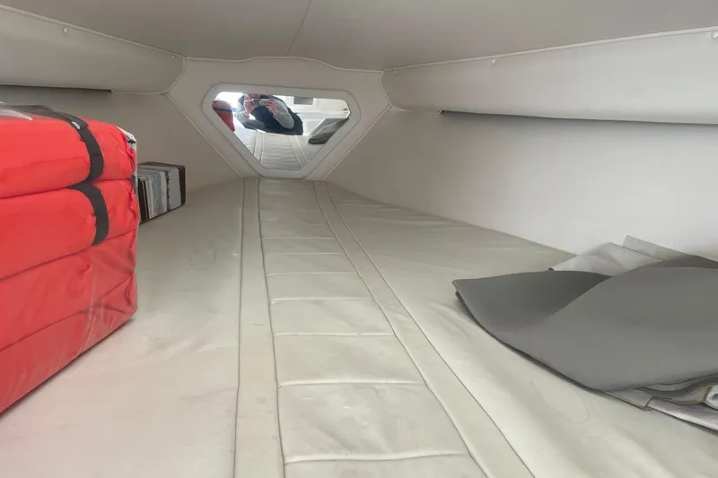 Slide: The Image of Interior cabin of 1998 Fountain 29 Fever boat with red life jackets. - 29