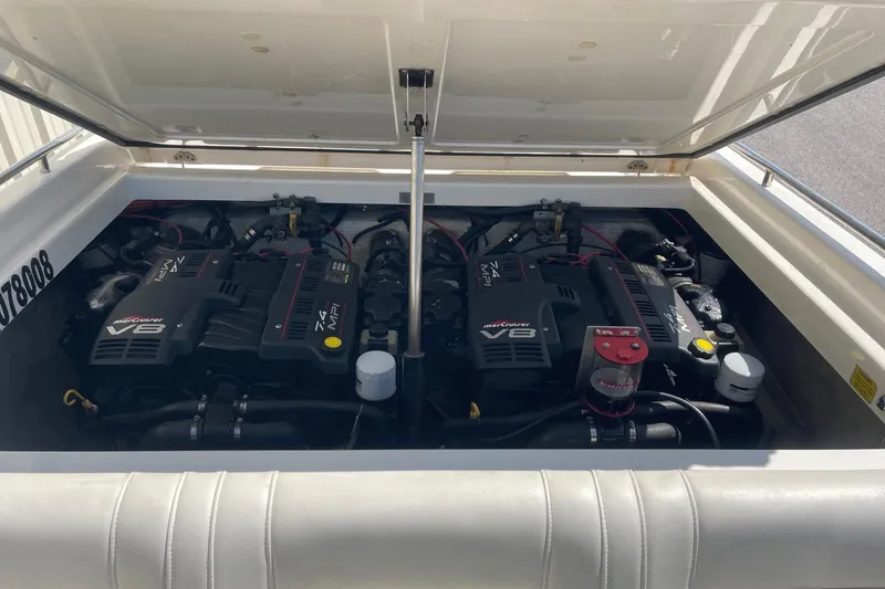 Slide: The Image of Twin MerCruiser V8 engines in a 1998 Fountain 29 Fever boat. - 9