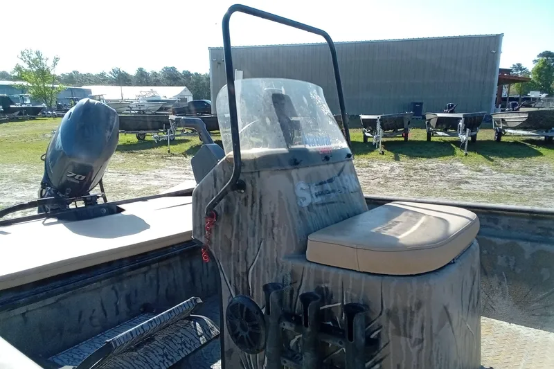 Slide: The Image of 2015 SeaArk 170 RX boat with Yamaha outboard motor in a boatyard. - 17