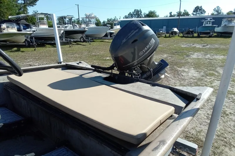 Slide: The Image of 2015 SeaArk 170 RX boat with Yamaha outboard motor in a boatyard. - 9