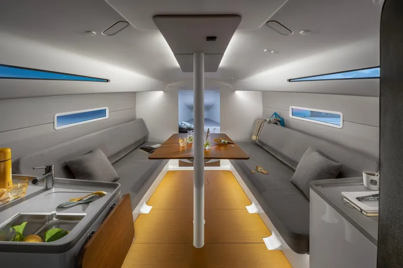 Slide: The Image of Modern interior of 2026 Beneteau First 30 sailboat, featuring sleek design and comfortable seating. - 9