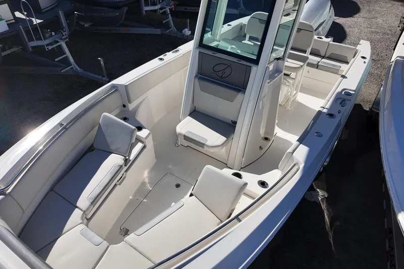 Slide: The Image of 2026 Sailfish 232 CC boat interior with spacious seating and modern design. - 7