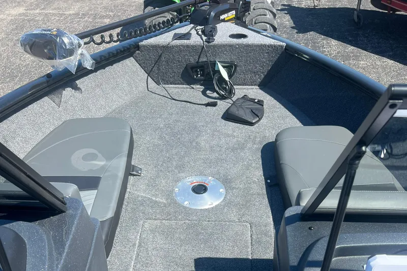 Slide: The Image of 2026 Tracker Pro Guide V-175 Combo boat interior with seating and trolling motor. - 2