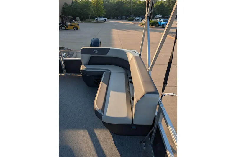 Slide: The Image of 2026 Sun Tracker Bass Buggy 16 XL Select pontoon boat with comfortable seating. - 7